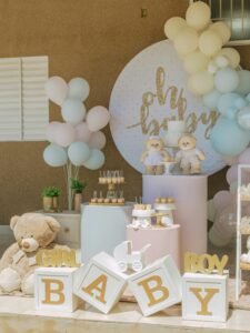 Stylish baby shower setup featuring teddy bears and pastel decorations, perfect for a gender reveal party.